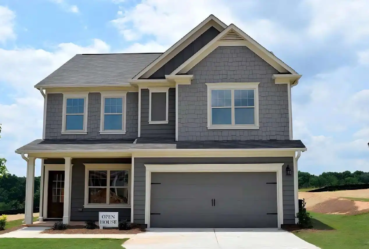 When is a rainscreen required by code for metal panels?