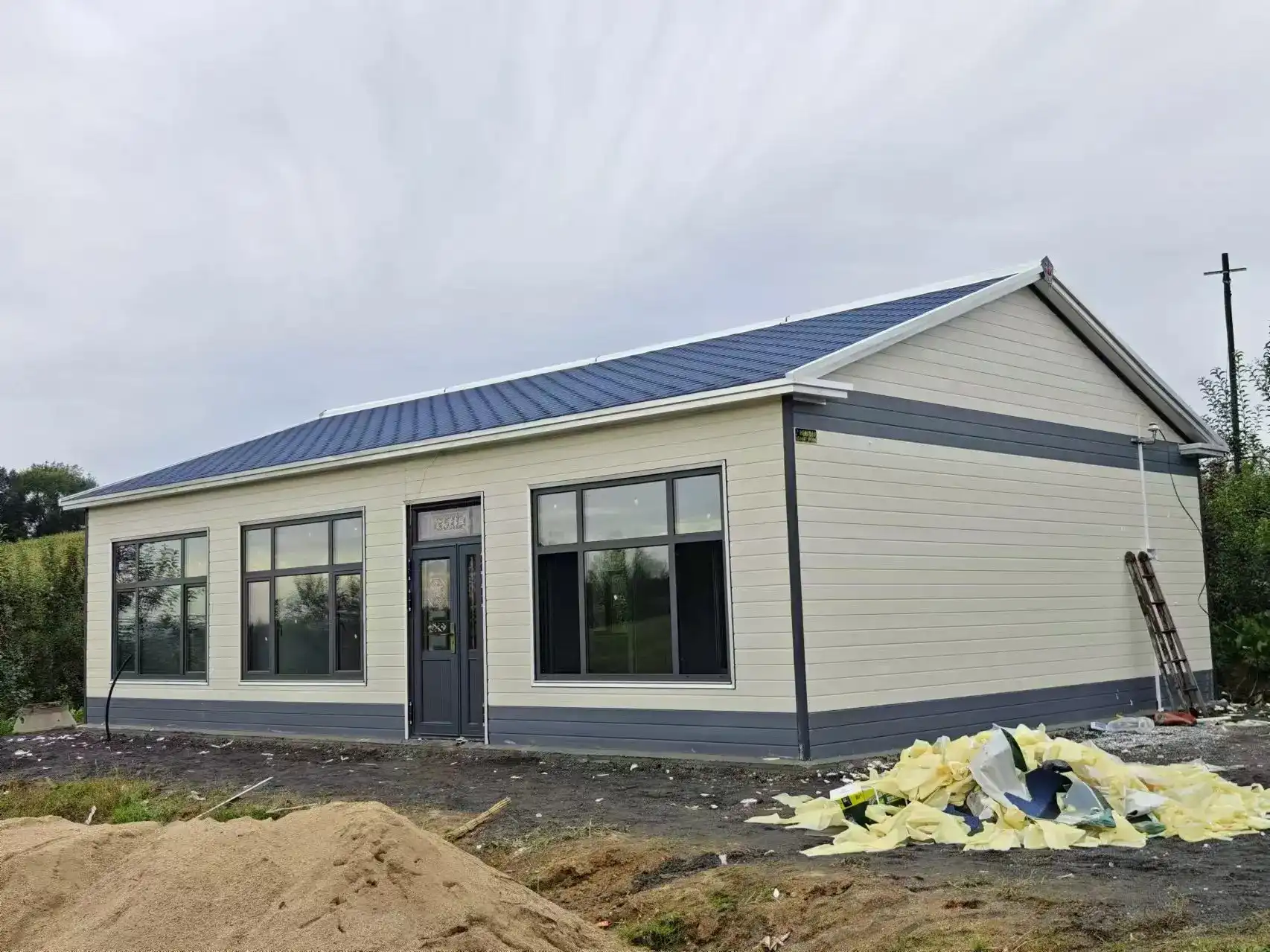 How Do Metal Siding Panels Compare to Other Shed Materials?